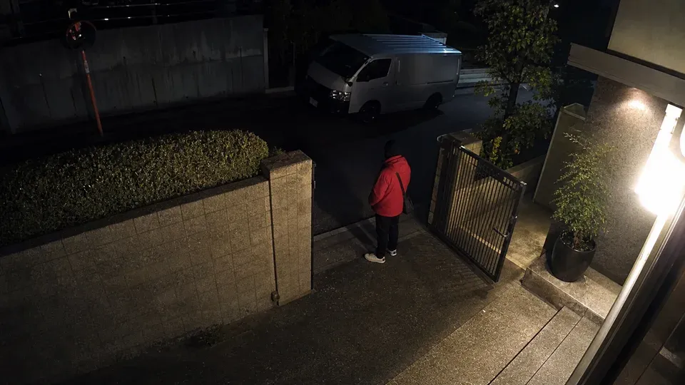 Security camera footage of the side gate at night