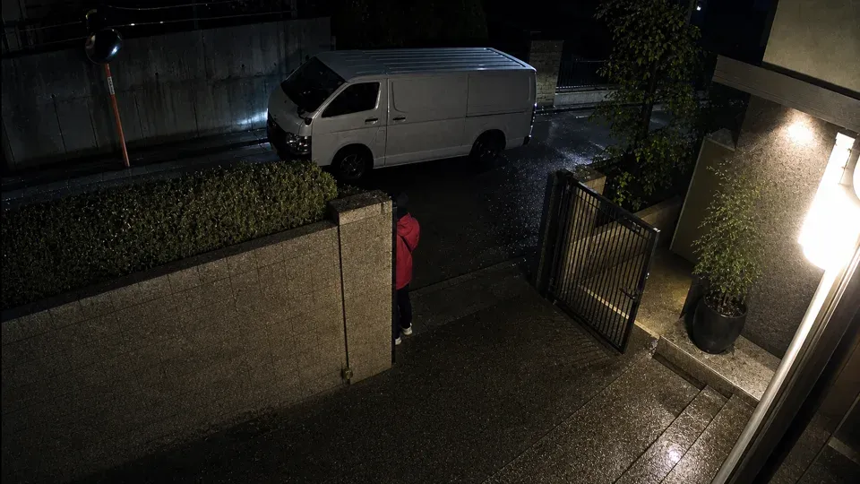 Delivery van parked near the side gate